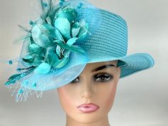 "The hat featured here is a teal straw hat with a small brim. On the side of the hat is a gorgeous creation made with crinoline, silk, satin, feathers and netting with blue dots. This is a one of a kind  hat was made by Letty. Creating the look that suits you best can be achieved just by  turning the hat on your head creating a different look with each twist till you find the look you love.. This classic hat is a beautiful Church hat or a Kentucky Derby Hat.  Also perfect  for  an Easter Hat, Te Adjustable Top Hat For Summer Country Events, Adjustable Fedora Mini Hats For Races, Adjustable Mini Fedora Hats For Races, Spring Wedding Fedora Costume Hat, Summer Adjustable Top Hat For Country Events, Fitted Brimmed Mini Hats For Country Events, Blue Fedora For Summer Parties, Blue Summer Fedora For Parties, Summer Party Fedora Costume Hat