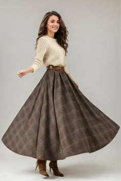 This winter wool skirt is a classic piece of tailoring that will see you through rain or shine. It is cut with a flattering flared skirt to give you a wonderful shape. The winter skirt is perfect classic styling and ends at the ankle. This is a versatile skirt that you'll wear again and again. Warm Skirts For Winter, Wool Skirt Pattern, Winter Wool Skirt, Winter Skirt Outfits, Cloak Dress, Warm Skirts, Winter Skirts, Summer Coats, Winter Skirt Outfit