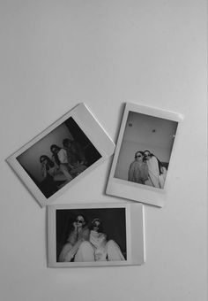 three black and white photographs of women in sunglasses on a table with one woman taking a selfie