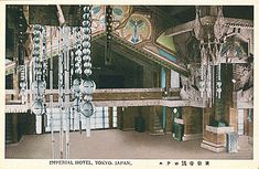 an old postcard shows the interior of a building with chandeliers hanging from it's ceiling