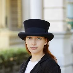 Blue navy Top Hat, for men and women Made with high-quality, thick and durable blue navy merino wool felt. Embellished with a 50 millimeters (2 inches) wide red grosgrain ribbon and a 2.5 cm (1 inch) grosgrain ribbon folded at the end of the brim. Formal hat for elegant events with a low crown and short brim. The shape of the hat is very balanced, with a crown slightly wider at the top and the brim made with a nice curved shape Measurements in centimeters are 31 x 26 (12 x 10.25 inches) - Crown height 10.5cm (4 inches) - Brim length 5cm (2 inches) These measurements may have some slight variations depending on the size of the hat. CUSTOM HAT OPTIONS: 1- You can choose between a grosgrain ribbon inside or a real leather inner sweatband. 2- For this hat I use a blue navy color grosgrain ribb Blue Top Hat, Formal Hat, Period Pieces, Victorian Hats, Navy Blue Top, Top Hats, Hat For Men, Hat For Man, Off White Color