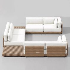 two white couches sitting next to each other