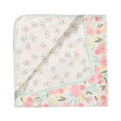 a blanket with pink flowers on it