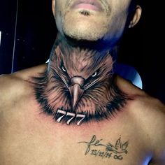 a bald man with an eagle tattoo on his chest