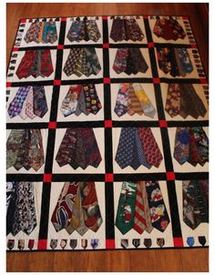 a quilted table top with many different ties on it