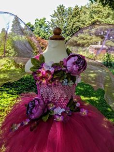 a dress made out of tulle and flowers