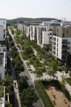 an aerial view of a city with lots of trees