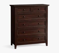 a dark wood dresser with five drawers