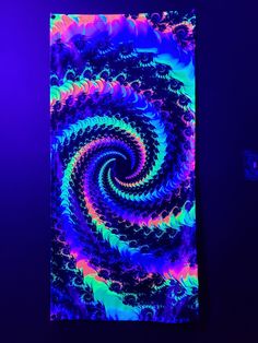 an abstract painting in purple, blue and green colors with a spiral design on it