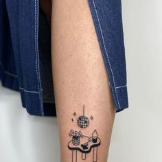 a person with a tattoo on their leg