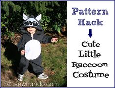 a little boy wearing a raccoon costume with the words cute little raccoon costume