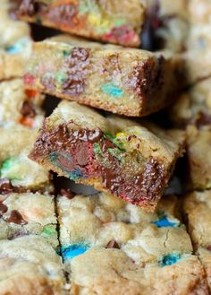 chocolate chip cookie bars stacked on top of each other with colorful sprinkles