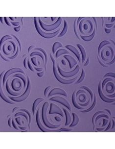 a purple wall with swirls on it