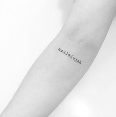 a person with a tattoo on their arm that reads,'i am beautiful '