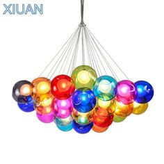 a multi colored chandelier hanging from the ceiling