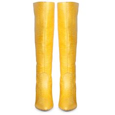 The Saint Adella yellow leather boot is a luxury that cleverly combines a stylish youthful outlook. These knee high boots have a emobssed leather upper and a pointed toe to add a touch of style to your everyday look. Made from the finest materials. Features a covered stiletto heel, stitching details with paneled finish. complete with leather & fleece lining, padded leather footbed with stamped logo. the gorgeous boot sit on a 2.9 inches stiletto heel. The approx. height of the boot is-18.5 Inche Yellow Pointed Toe Party Boots, Yellow Pointed Toe Boots For Party, Yellow High Heel Boots For Fall, Fitted Yellow High Heel Boots, Chic Yellow Boots For Fall, Yellow Leather Boots With Snip Toe, Yellow High Heel Leather Boots, Yellow Leather Boots For Fall, Yellow Leather Boots With Pointed Toe