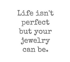 the words life isn't perfect but your jewelry can be written in black ink