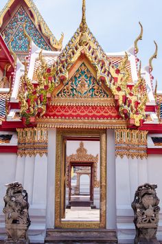 the entrance to an elaborately decorated building