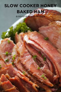 ham and broccoli on a white plate with parsley in the middle, ready to be eaten