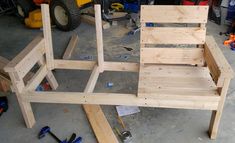 a wooden chair being built in a garage