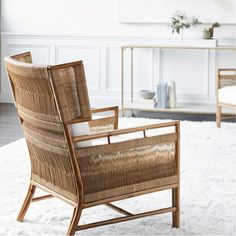 a living room filled with furniture on top of a white rug