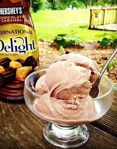 an ice cream sundae with a bottle of hershey's international delight