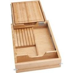 an open wooden box with compartments on the inside