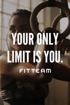 a woman holding two rings with the words, your only limit is you fitteam