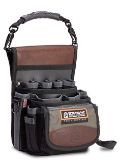 an image of a tool bag with tools in the pocket and straps around it on a white background