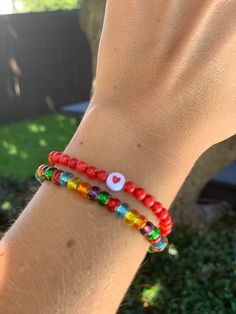 Circular red beads sealed with a heart for lasting luck in love combined with a multi color strand of glass seed beads! - Standard bracelet size is 7 inches. Please message me if you have smaller or larger wrists. Red Casual Letter Beads Jewelry, Red Beads, The Lover, Red Bead, Glass Seed Beads, Art Accessories, Dallas Tx, Bracelet Sizes, A Heart