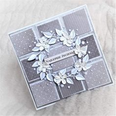 a close up of a card with flowers on it and the words nameplate accented