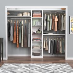 an open closet with clothes hanging on the shelves