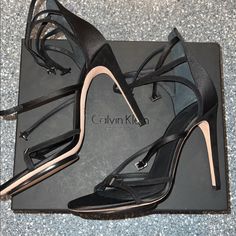 Calvin Klein Collection Black Satin Heels, Absolutely Stunning Shoes, Buckles And Satin Straps, 4.5 Heel, Size 39(9). Original Price $1,065.00! New In Box Designer Open Heel Heels For Gala, Evening Heels With Branded Heel Counter, Designer Ankle Strap Heels For Events, Designer High Heels With Heel Strap, Designer Evening Heels With Heel Strap, Designer Heels With Heel Strap For Cocktail, Designer Heels With Heel Strap For Evening, Luxury Evening Heels With Wrapped Heel, Designer Heels With Heel Strap For Cocktail Occasions