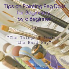 some paint brushes are in a jar with the words tips on painting peg dolls for beginners