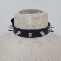 Handmade leather choker adjustable from 13 inches up to 16 inches. (13", 13 1/2", 14", 14 1/2", 15", 15 1/2", 16") leather is ~ 1.8 to 2.2 MM thick choker contains 7 spikes (0.5 inch in lenght) Rocker Style Festival Choker Jewelry, Punk Choker With Spikes, Gothic Spiked Choker For Festivals, Adjustable Gothic Choker For Alternative Fashion, Punk Leather Jewelry For Festivals, Punk Style Spiked Choker Jewelry, Punk Style Spiked Choker, Concert Choker With Spikes, Spiked Choker For Concert