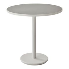 a white table with a round base on an isolated white background for use as a side table