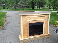 a fire place sitting in the middle of a driveway