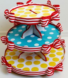 three tiered cake stand with polka dots and bows