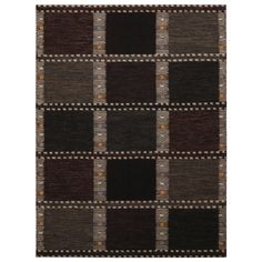 a black and brown rug with squares on the bottom, in different sizes and colors