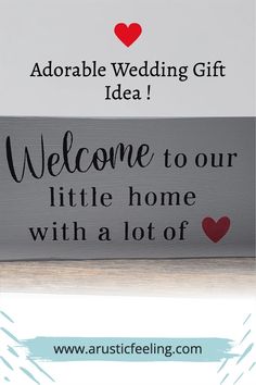 a wooden sign that says, welcome to our little home with a lot of love