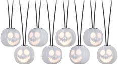 six halloween lights with skulls on them