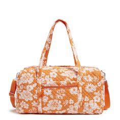 Going home for the weekend or out for an overnight getaway? This duffel will help you pack it all in style. Exterior features one zip and three slip pockets Interior features three mesh slip pockets Detachable shoulder strap has shoulder pad for comfort Zip closure Capacity 50 L. Vera Bradley Outlet Large Travel Duffel Bag in Orange/White Rain Garden Overnight Bag Aesthetic, Cute Duffle Bag, Travel Duffle Bag Women, Large Weekender Bag, Vera Bradley Duffle Bag, Weekend Duffle Bag, Yellowstone Trip, Activity Bags, Pjo Dr