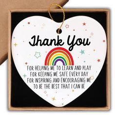 a heart shaped ornament with the words thank you for helping me to learn and play