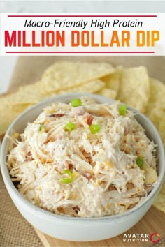 a white bowl filled with chicken salad next to tortilla chips