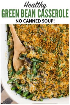 green bean casserole in a white dish with a wooden spoon and text overlay that reads healthy green bean casserole no canned soup