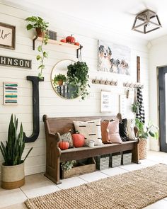 an instagram photo with a bench and potted plants on the wall above it