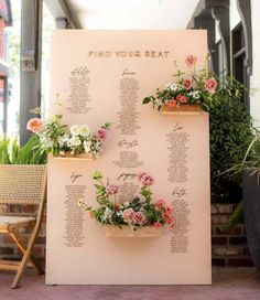 a seating chart with flowers on it