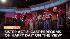 a group of people on stage with the words sister act cast performers oh happy day on the view