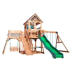 a wooden playset with a green slide and swing set in front of white background