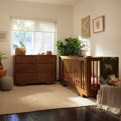 Designed to complement the Yuzu 8-in-1 all-stages, the Yuzu 6-drawer dresser marries form and function with playful arched feet, gently curved corners, and plenty of storage with 6 spacious drawers. Whether you're going for a classic, modern, or eclectic look, this versatile dresser is a perfect statement piece in the nursery. babyletto Color: Natural Walnut | babyletto Yuzu 6-Drawer Dresser 40.0 H x 19.0 W x 48.0 D in brown / green / yellowWood in Natural Walnut | 34" H X 48" W X 19" D | Wayfai Babyletto Yuzu, Junior Bed, Stylish Nursery, Walnut Furniture, Kids Dressers, Mini Crib, Convertible Crib, 6 Drawer Dresser, Bedroom Dressers